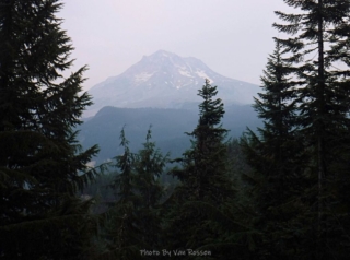 I reach an opening in the for a smoky view of Mt. Hood