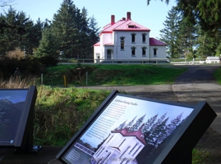 Sign and Lighthouse keepers house