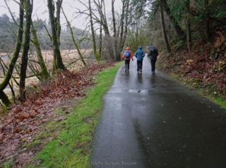 Heading off down the trail in a lite rain.