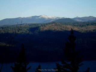 Snow on the hills across the river but nun where I am
