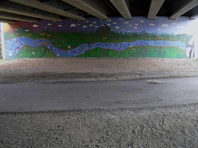 A fresh mural cover the graffiti