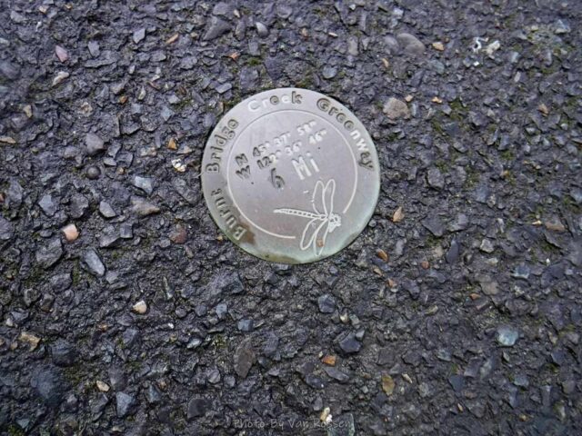 You can find markers in the trail showing mileage